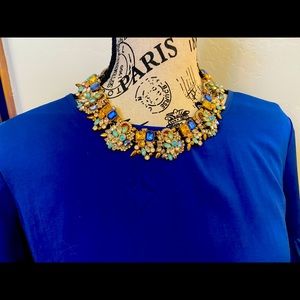 Costume jewelry multicolored necklace in shades of blue, clear, aqua, yellow